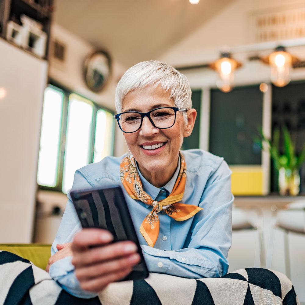 Woman with a mobile phone in hand